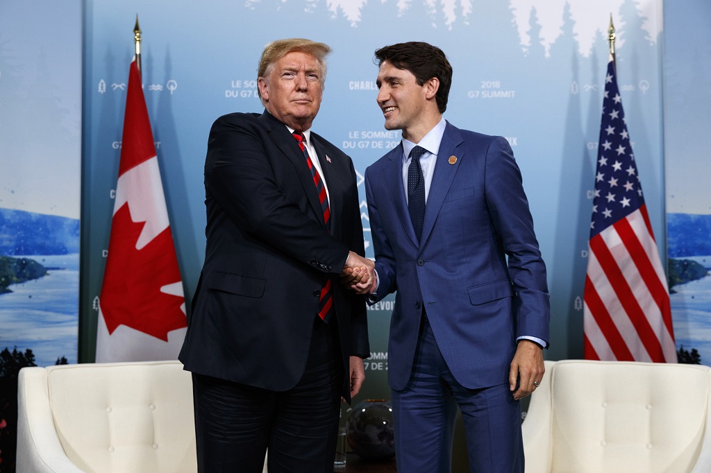 President Donald Trump meets with Canadian Prime Minister Justin Trudeau during the G-7 summit, Friday, June 8, 2018, in Charlevoix, Canada. (AP Photo/Evan Vucci)