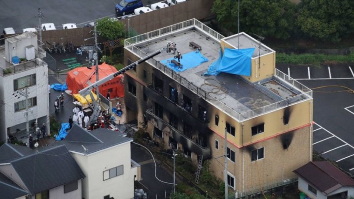 This aerial view shows the rescue and recover scene after a fire at an animation company building killed some two dozen people in Kyoto on July 18, 2019. - At least 24 people were feared dead in a suspected arson attack on the animation company in the Japanese city of Kyoto on July 18, a fire department official told AFP. (Photo by JIJI PRESS / JIJI PRESS / AFP) / Japan OUT        (Photo credit should read JIJI PRESS/AFP/Getty Images)