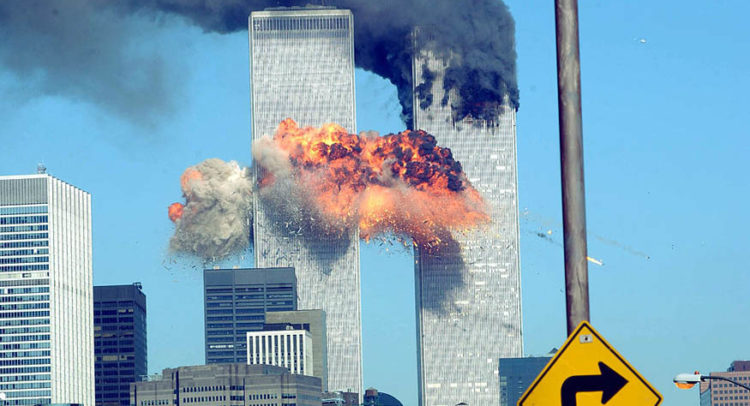 394261 14: A fiery blasts rocks the World Trade Center after being hit by two planes September 11, 2001 in New York City. (Photo by Spencer Platt/Getty Images)