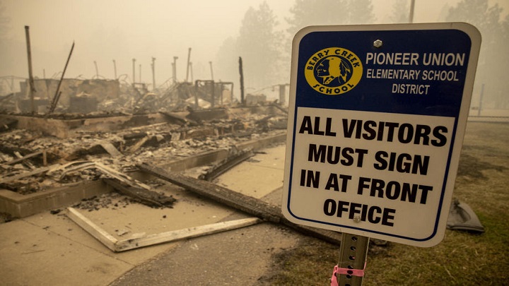 epa08665600 The remains of the Pioneer Union Elementary School after it was destroyed by the Bear fire, part of the North Complex fires, in Berry Creek, California, USA, 12 September 2020. According to reports, more than 100 wildfires are burning across 12 western USA states.  EPA-EFE/PETER DASILVA