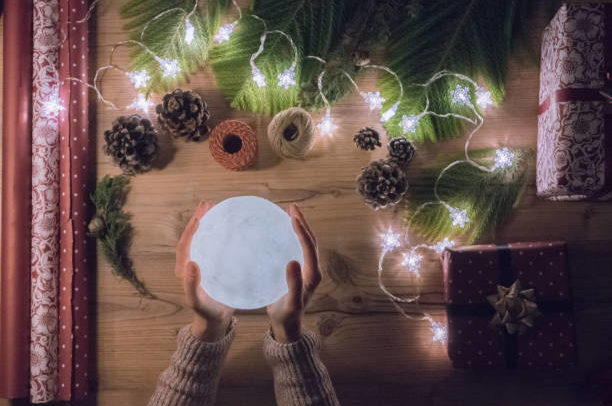 Women hand holding moon Flat lay Christmas concept.